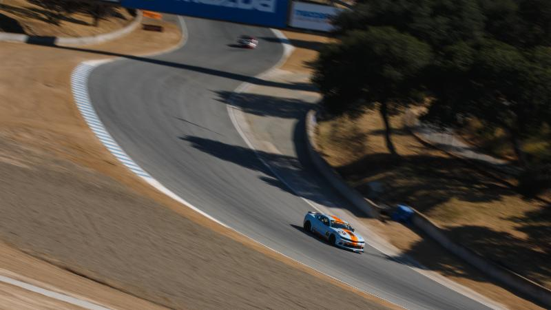 Illustration for article titled Surprise Marriage At Laguna Seca's Corkscrew Is The Cutest Thing Ever
